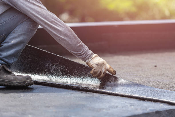 Professional Waterproofing technician working in Lawrence, IN